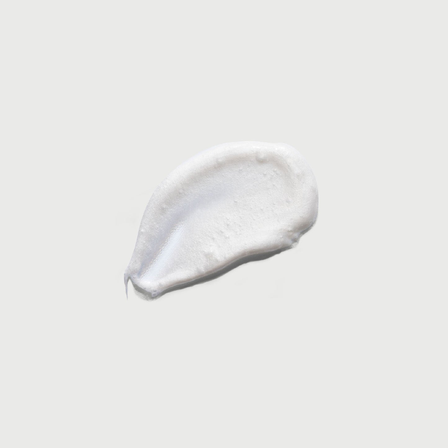 the-smoother-glycolic-acid-exfoliating-body-wash-l3 NATR-40002-Swatch-The-Smoother-Glycolic-Acid-Exfoliating-Body-Wash-bonebkgd.jpg