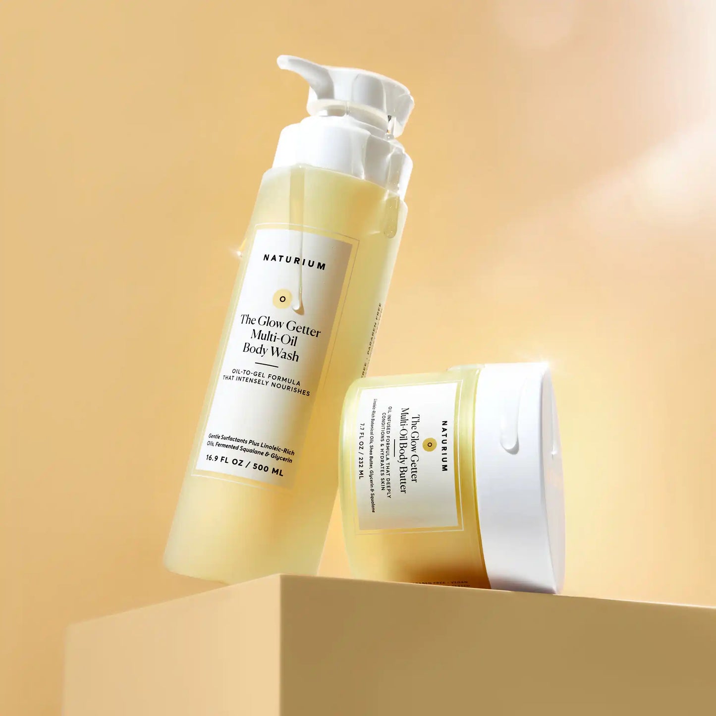 the-glow-all-out-body-bundle-l6 gg-bodybutter_1464-crop_revcolor_FL.webp